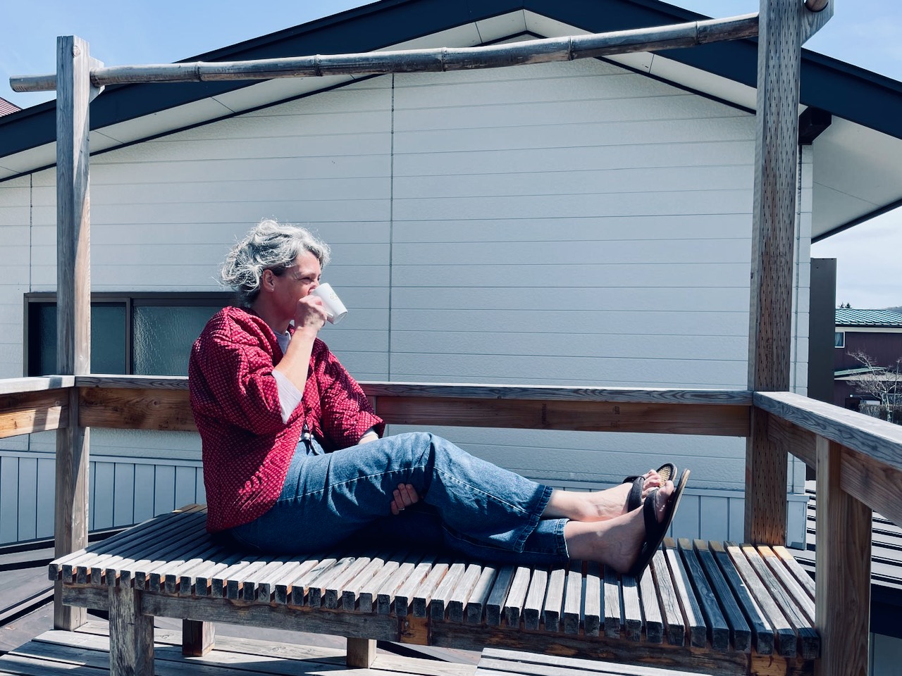 Soetkin drinking coffee on the terrace