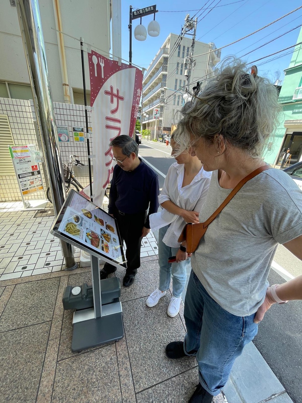 choosing what to eat in front of the hotel